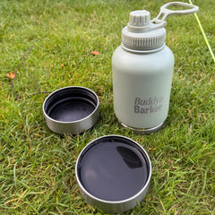 Buddy and Barker travel bottle with food and water bowls.