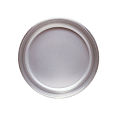 The inside of a stainless steel dog bowl